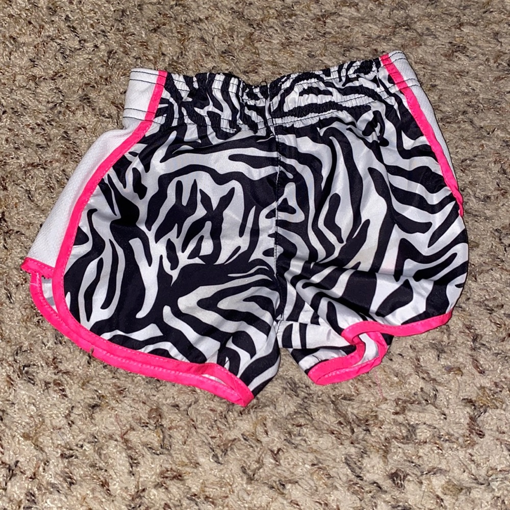 zebra striped running shorts